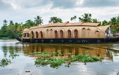 Traditional Indian houseboat near Alleppey on Kerala backwaters, India