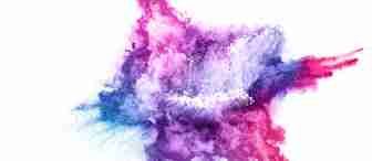 A vibrant explosion of colorful powder on a white background, resembling an abstract star shape. The colors include shades of pink, purple, blue, and a hint of red, blending seamlessly with each other and creating a dynamic, energetic visual effect.