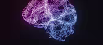 A digital illustration of a human brain is shown, composed of interconnected lines and nodes in a gradient of purple and blue colors against a dark background. The visualization emits a glowing effect, representing neural networks or artificial intelligence.