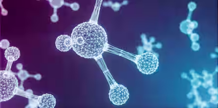 Digital illustration of floating molecular structures with interconnected spheres and lines on a gradient background transitioning from purple to blue. The image represents molecular or atomic models, commonly used in scientific and chemical contexts.