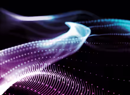 A dynamic abstract image featuring waves of purple and blue lines and dots against a black background. The lines and dots create fluid, flowing patterns that blend and intertwine, giving a sense of motion and energy.