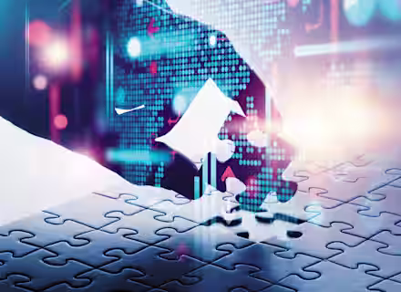 A digital representation of a hand made of glowing blue pixels places a piece in a jigsaw puzzle. The background features digital data elements such as graphs and abstract world maps, suggesting a blend of technology and problem-solving themes.