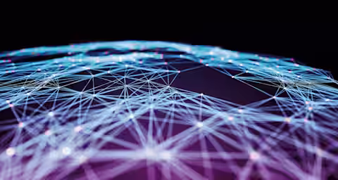 A dark background with a web of interconnected blue and purple lines forming a network. Numerous glowing white nodes are scattered throughout the web, creating a complex, geometric pattern that suggests a digital or technological theme.