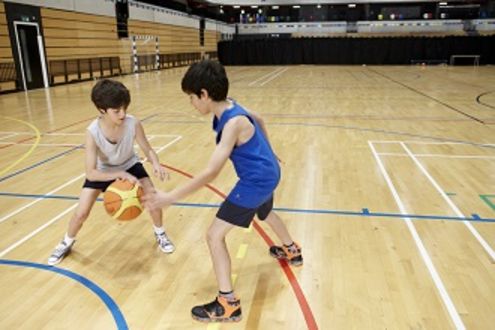 boys playing basketball