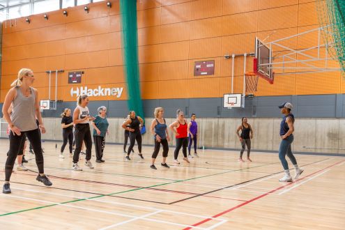 women exercising in sports hall