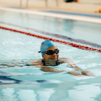 Female swimmer enjoying a swim for fitness session