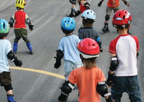 A photo of children skating