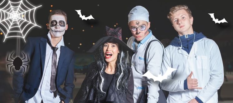 Group of people in Halloween costumes