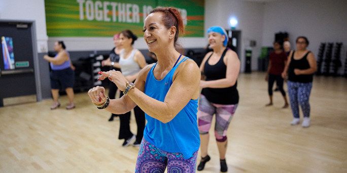 People in a group dance class