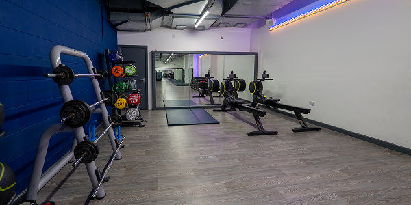 a view of the free weights and stretching area at Whalley Range gym