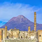 Ruins in Pompeii with Mount Vesuvius Beyond