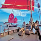 Three People Enjoying a Cruise on an old Refurbished Chinese Junk Boat Phuket