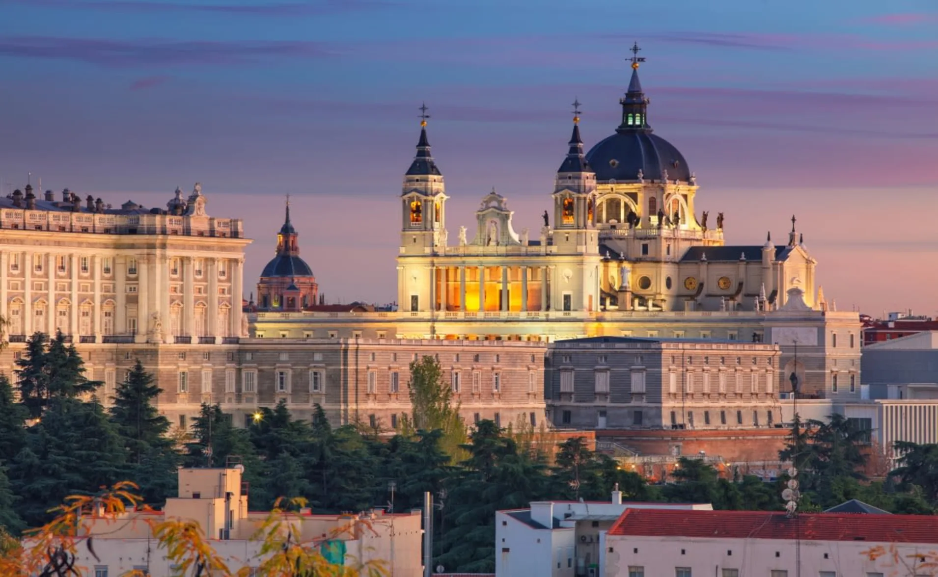 skyline of madrid with catedral de la almudena at sunset