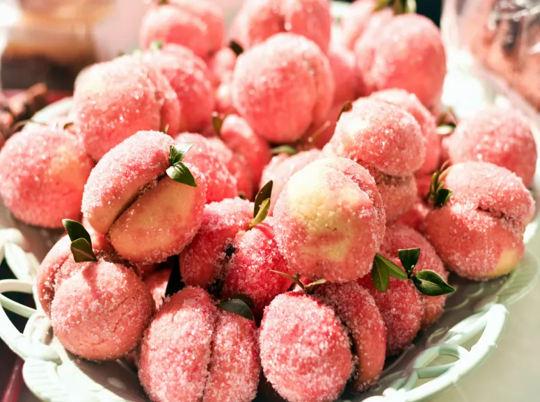 Bowl of Peaches Covered in Sugar