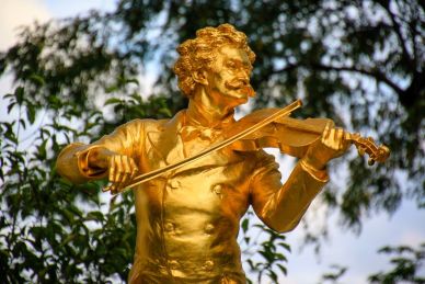 Golden Statue of Mozart Playing Violin