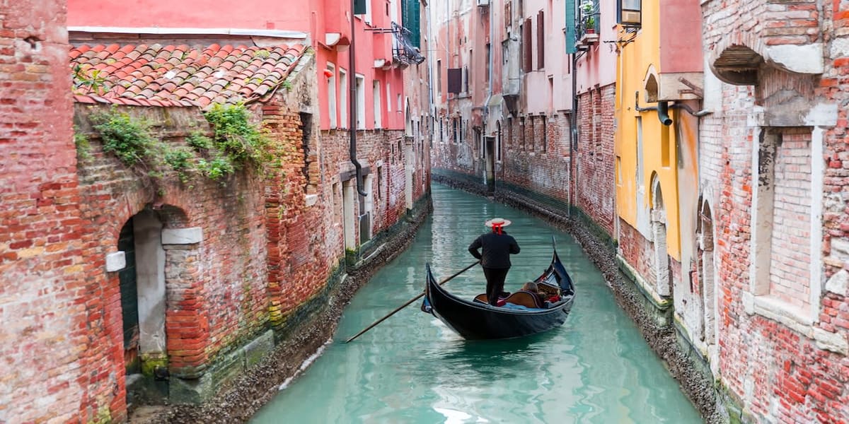 Gondola on a canal in Venice
