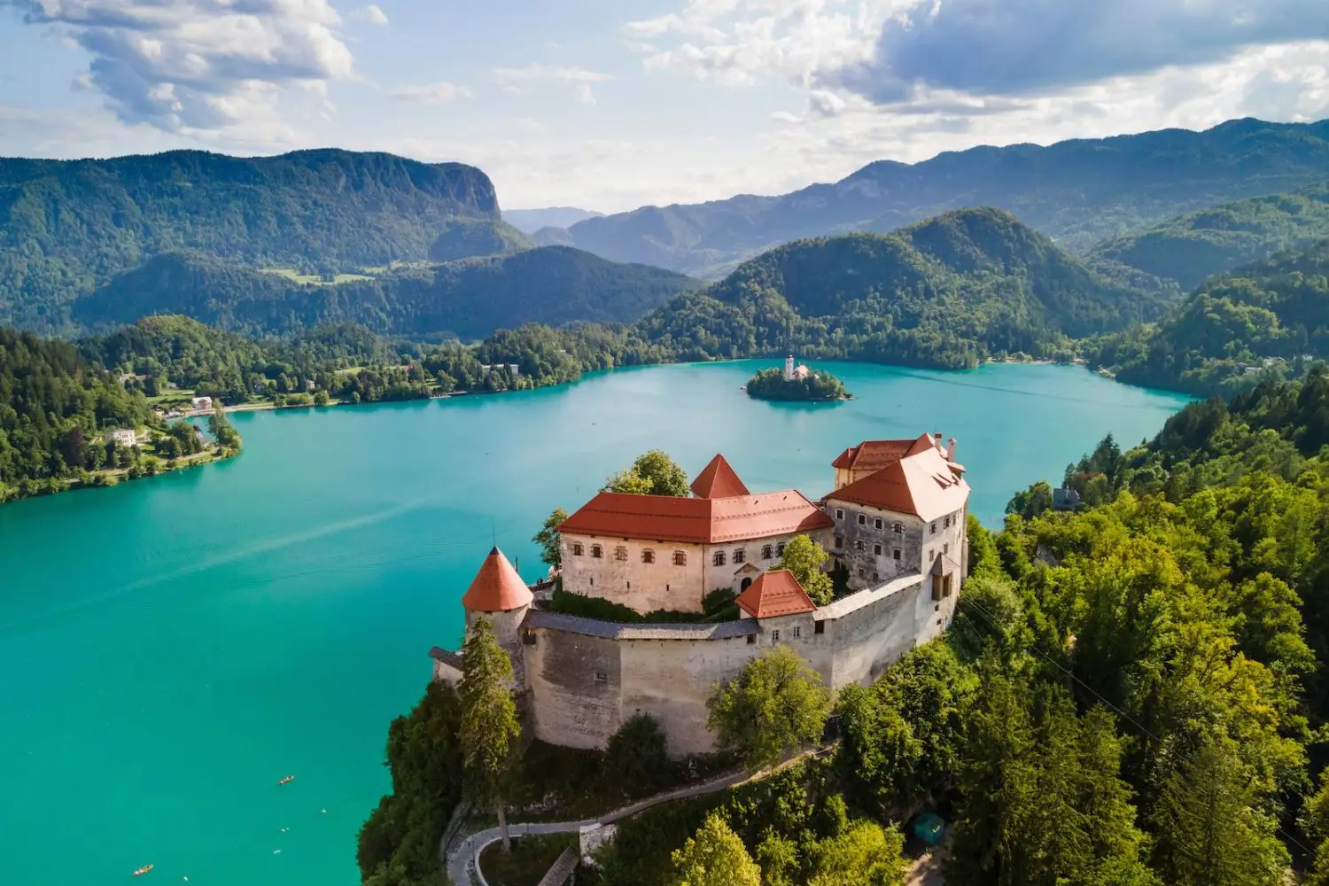 bled castle with lake bled in distance below it