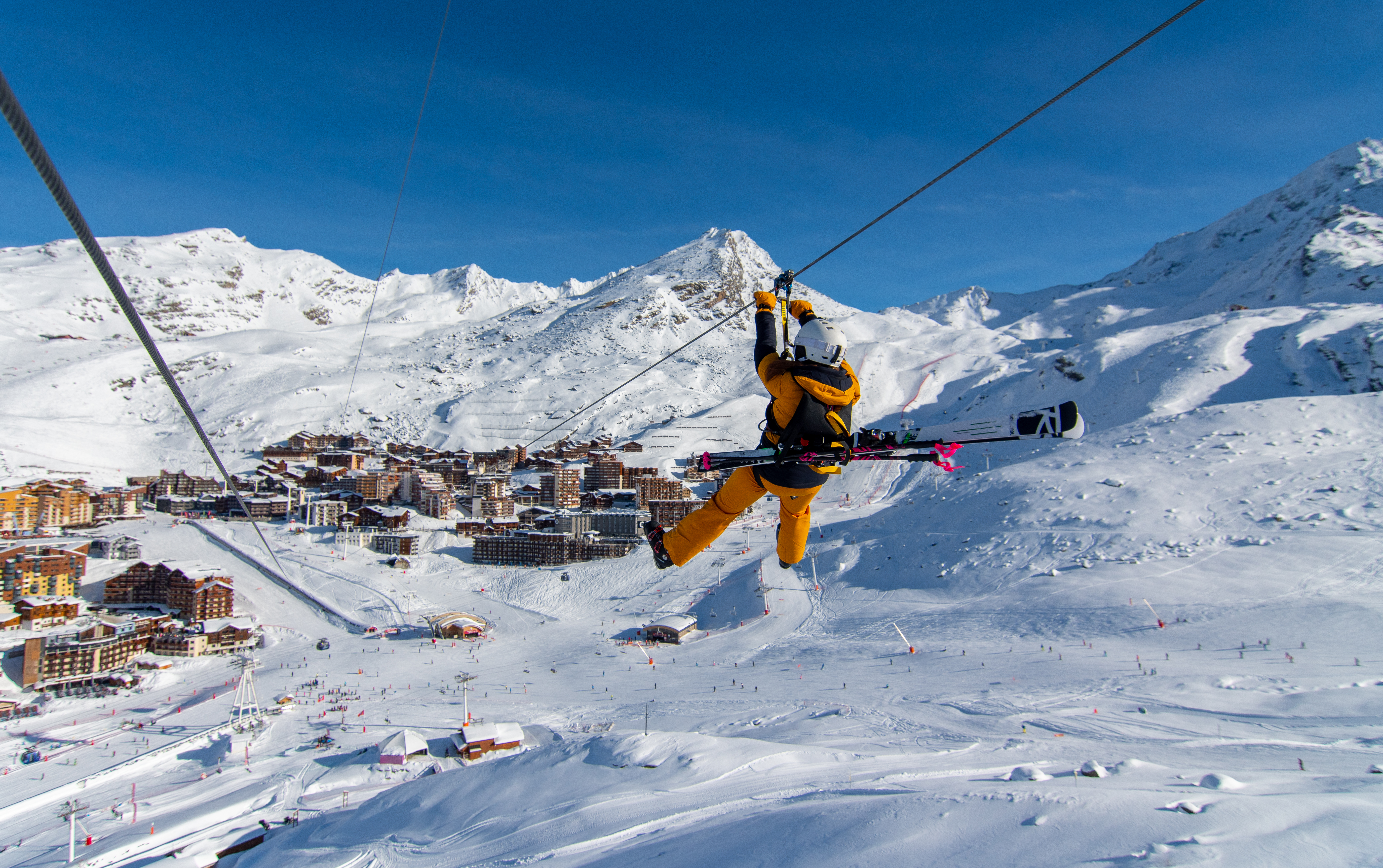 Skier on ski lift in Val Thorens