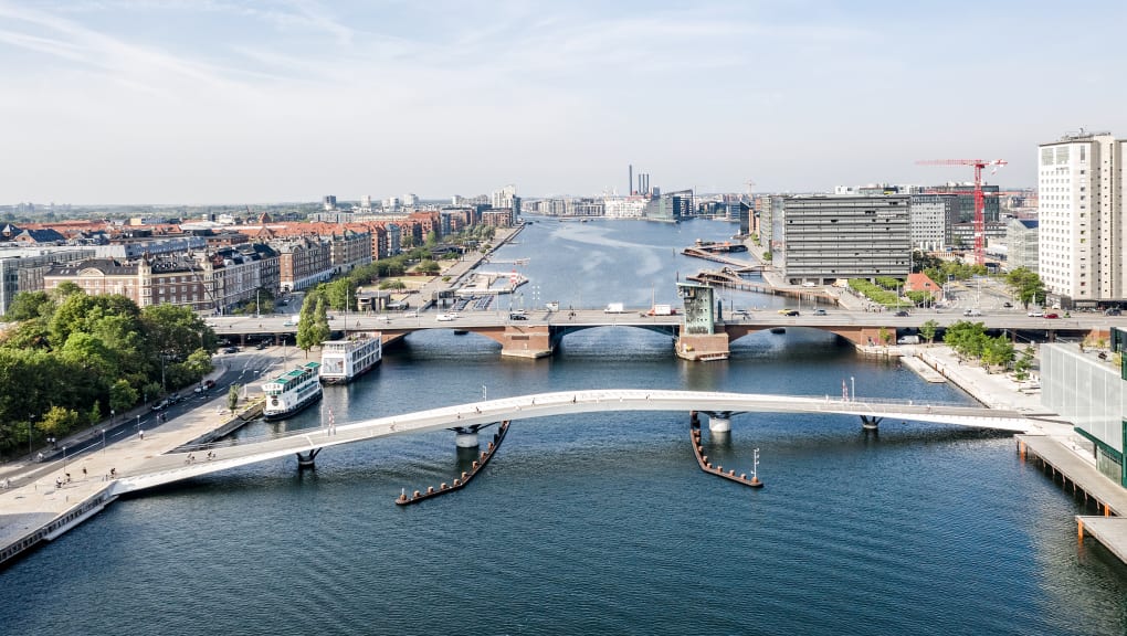 Long distance daytime aerial view of the Lille Langebro bridge