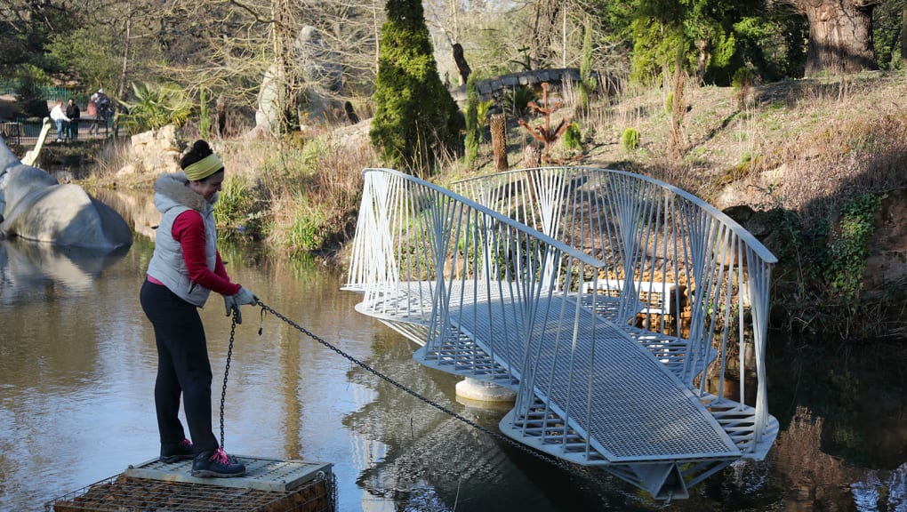 Exterior view on a sunny day of the swing bridge in Crystal Palace park being pulled into position