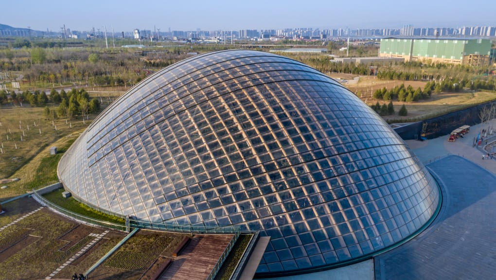 Wide aerial day time shot of the Taiyuan botanical garden domes