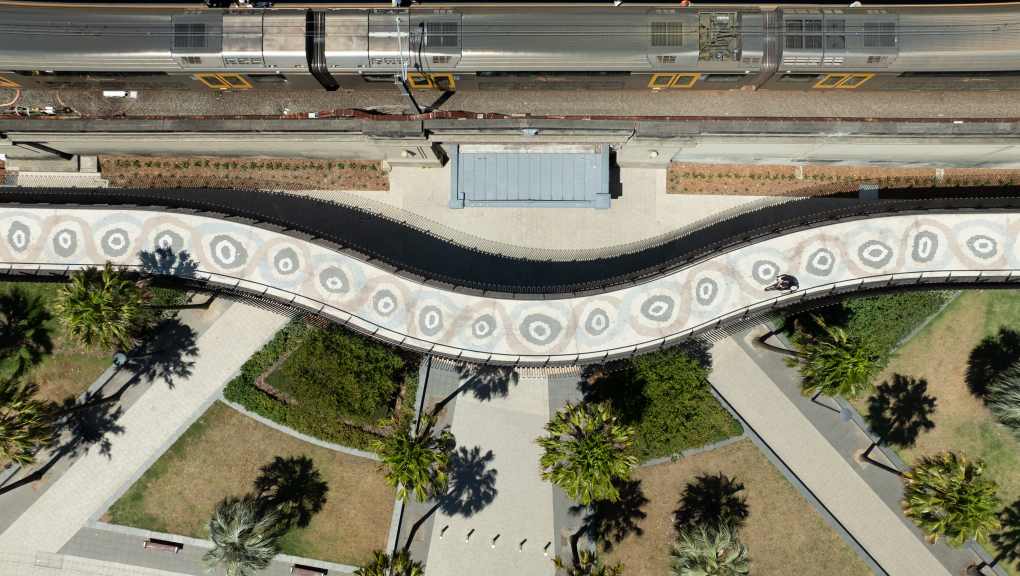 Aerial view over the cycleway. Copyright: Eckersley O'Callaghan, 2026.