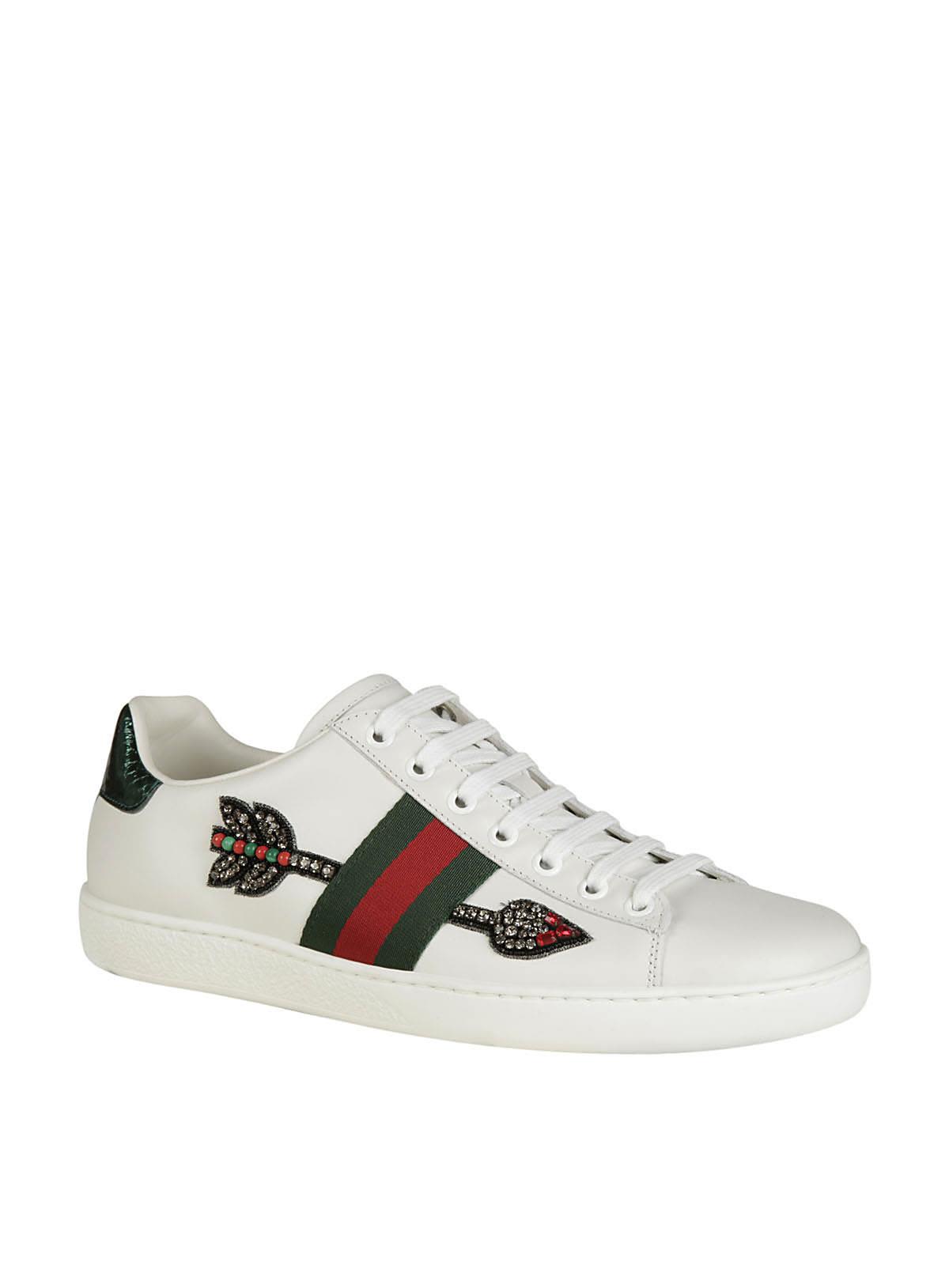 GUCCI New Ace Arrow-Embroidered Leather Trainers in White | ModeSens