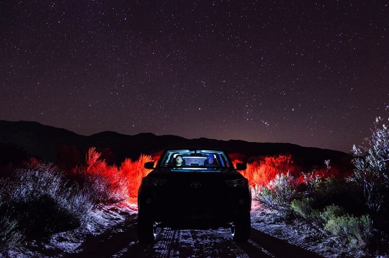Car at night under sky