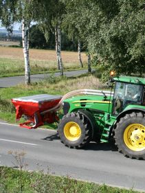 Kverneland F35 compact travelling on road with tractor