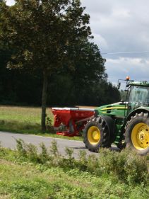 Kverneland F35 compact travelling on road with tractor