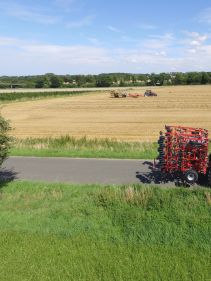 Kverneland ts-drill, transported compact on road by tractor