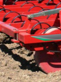 Seedbed Cultivators - Kverneland TLF performs precise depth control during operation on field