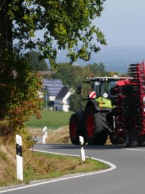 Kverneland U-drill, transported on road by tractor