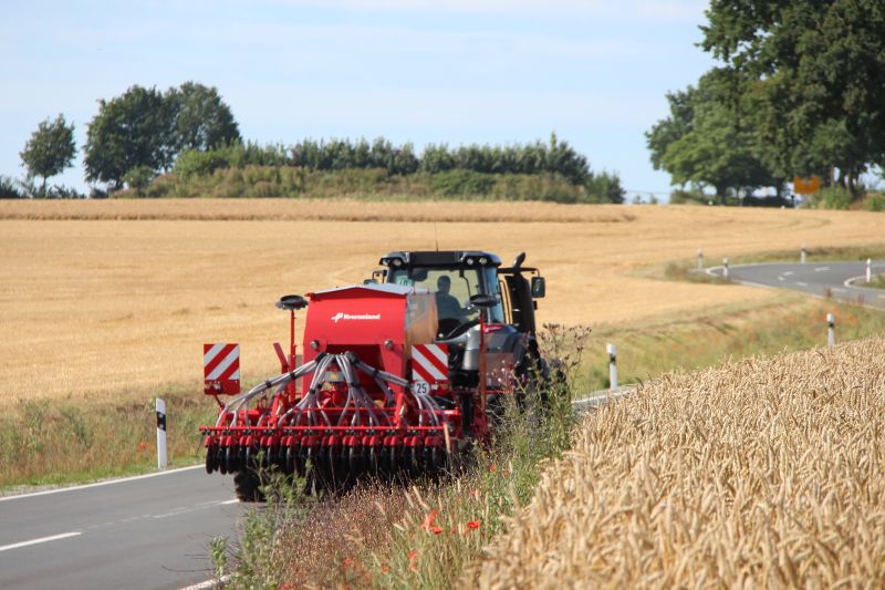 Kverneland U-drill, transported on road by tractor