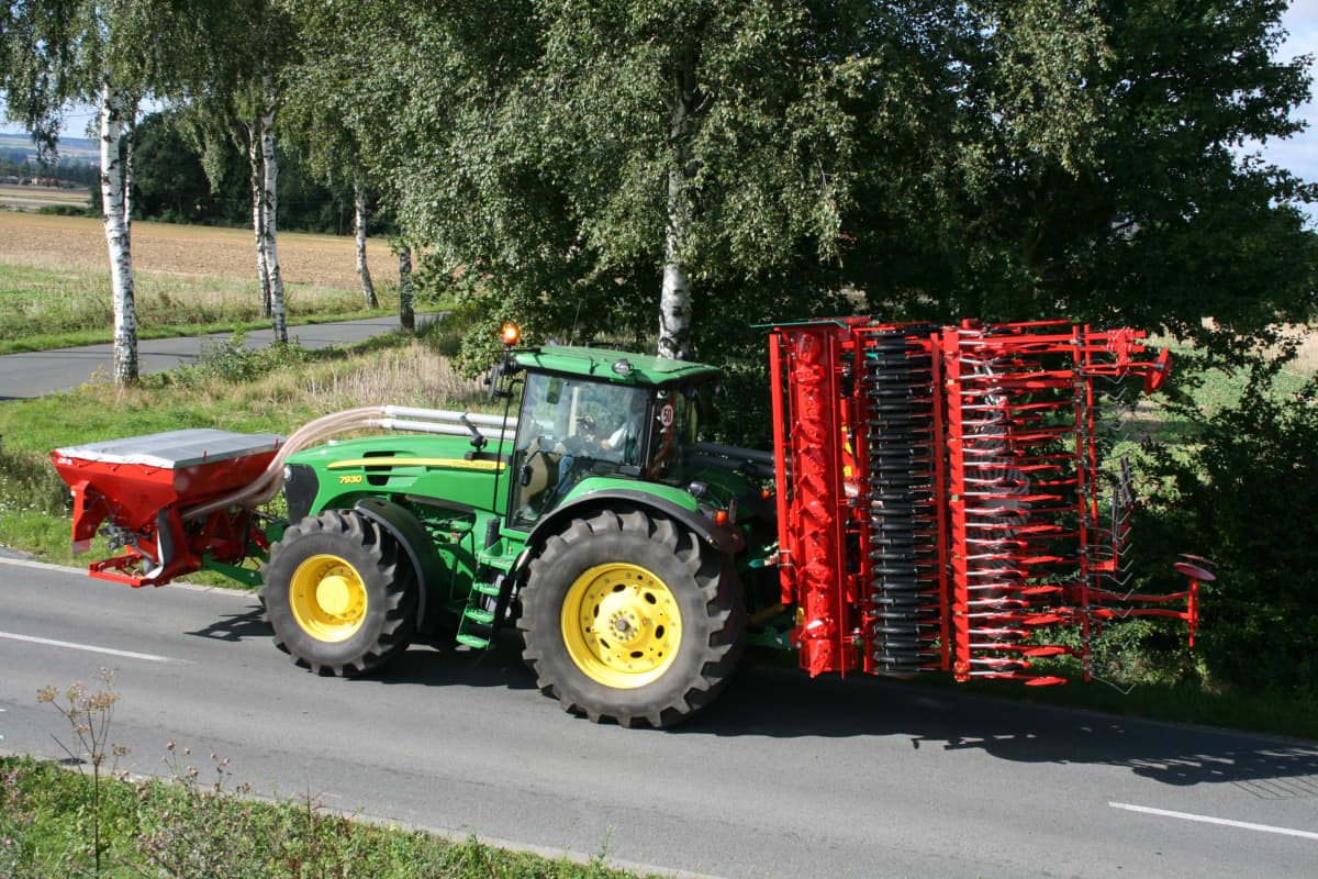 Kverneland F35 compact travelling on road with tractor