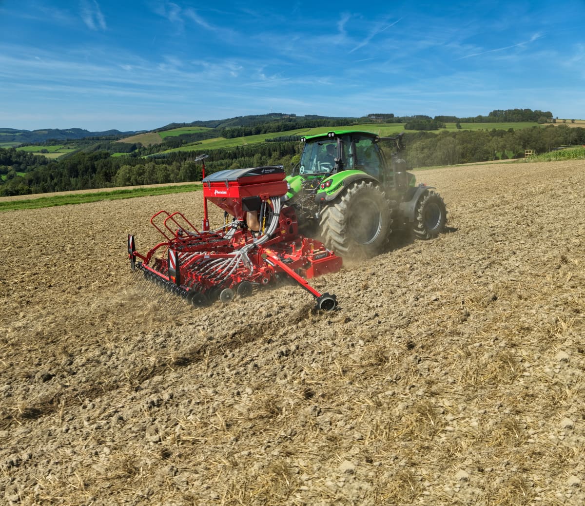 Kverneland - Kverneland-Saturia_3m-field-Deutz tractor.jpg