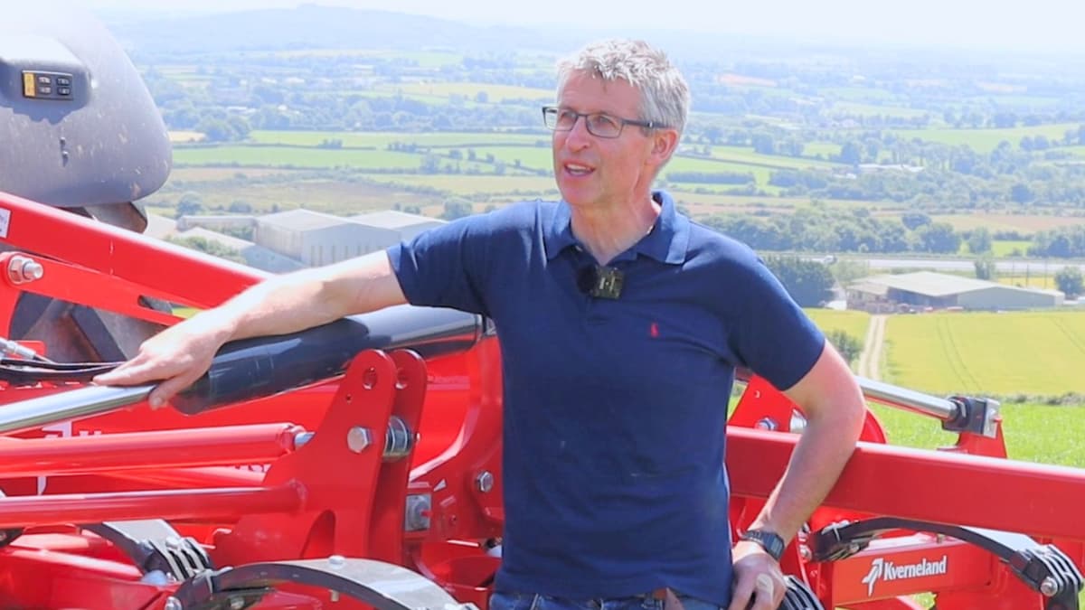 Tillage farmer Philip Kehoe, based in Co. Wexford in Ireland, standing in front of his Kverneland Enduro 5000F stubble cultivator