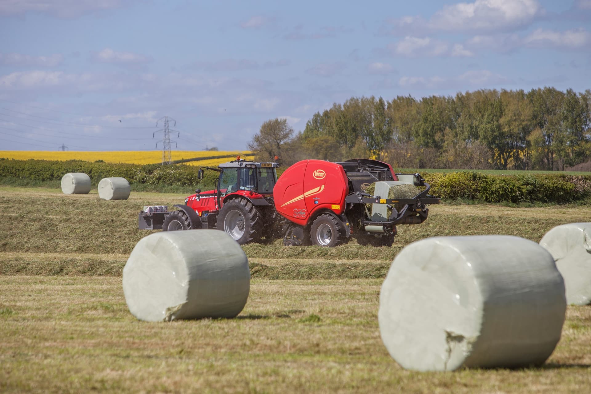 FastBale in field around wrapped bales