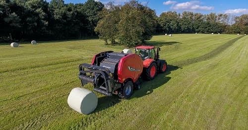 Gentle bale discharge and bale turner 