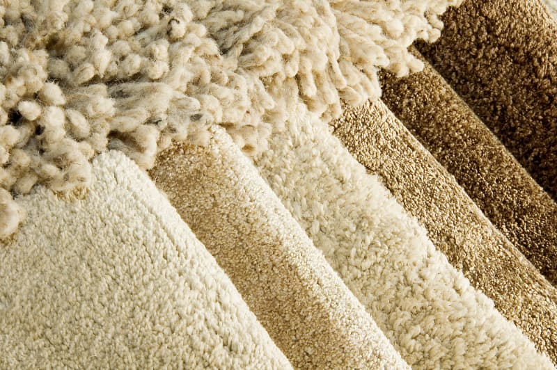 new carpet rolls in different beige colors