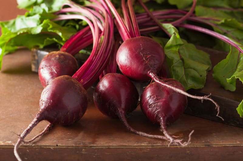 fresh beetroot on wood table