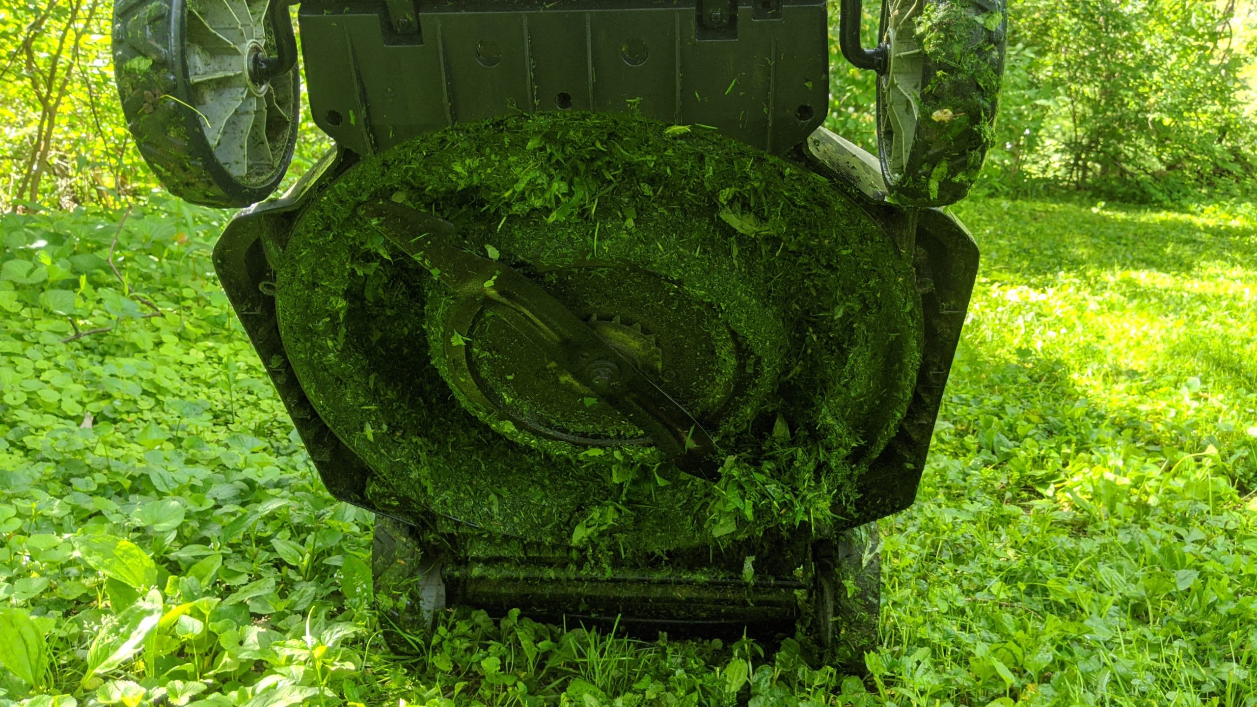 EGO LM2002 electric mower - underside with grass after wet cut