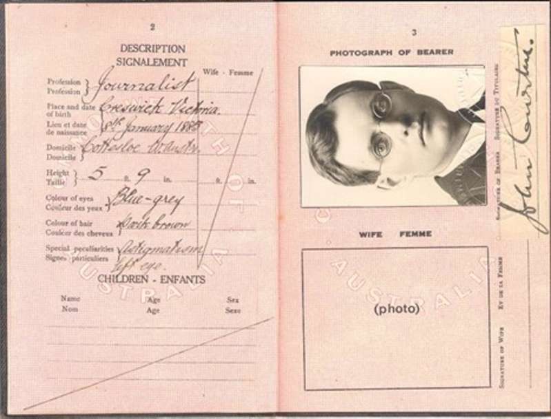 A scan of two pages inside Prime Minister John Curtin's passport from 1924. Curtin's eye colour, height and profession are listed on the left. A black and white photo of Curtin is on the right.