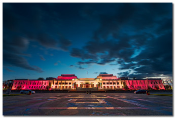 The building lit pink by Sam Ilić