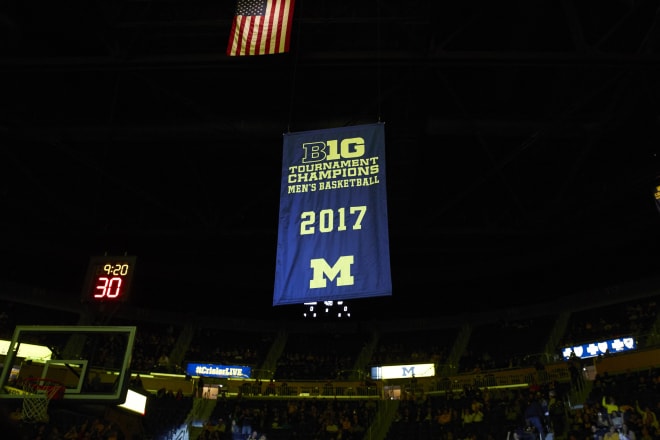 Michigan Wolverines hang 2017 Big Ten Tournament championship banner