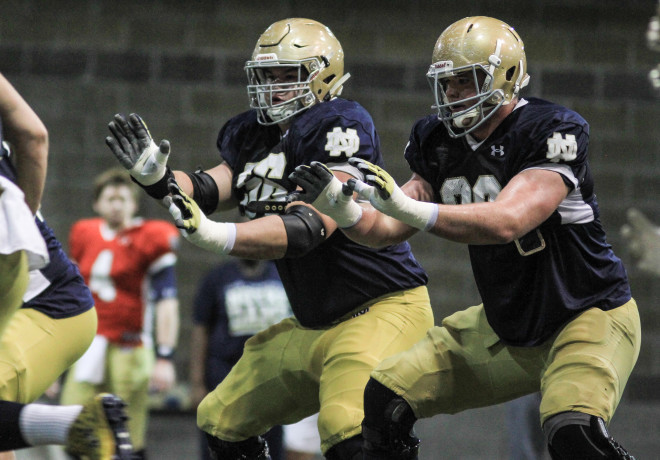 Guard Quenton Nelson (left) and tackle Mike McGlinchey (right) form an imposing tandem.