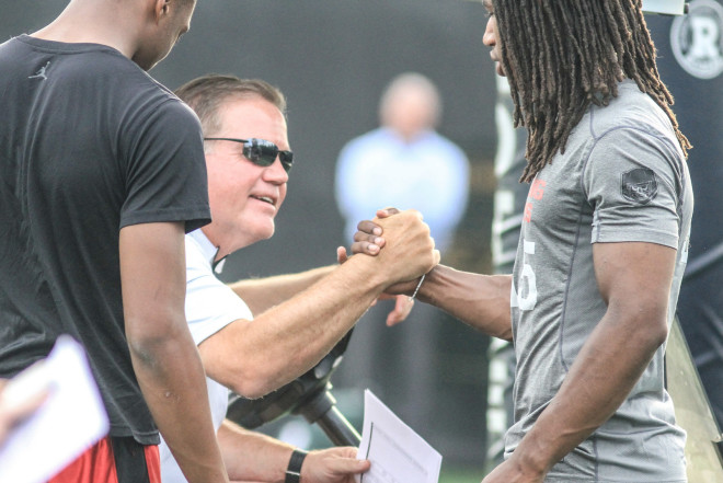 Notre Dame head coach Brian Kelly greets Jaylen Kelly-Powell at the Irish Invasion.