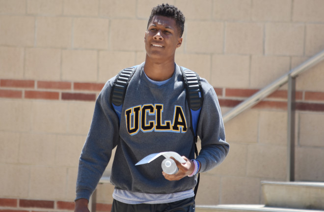 Quentin Lake wore a UCLA sweater to the Bruins' camp on Friday.
