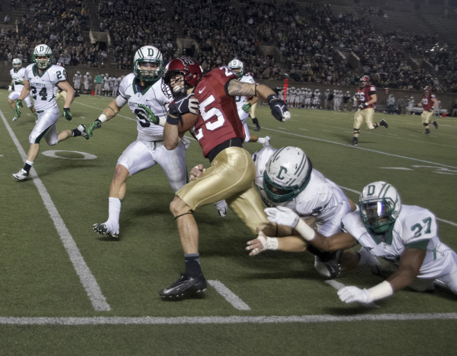 Dartmouth, seen here vs. Harvard, wants to leave tackling only to game day.