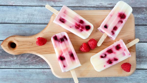 popsicles, berries, raspberry, cutting board